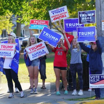 A Group Of Young Donald Trump Supporters In Ripon, Wisconsin, Holding Signs During The Runup To The 2024 Election