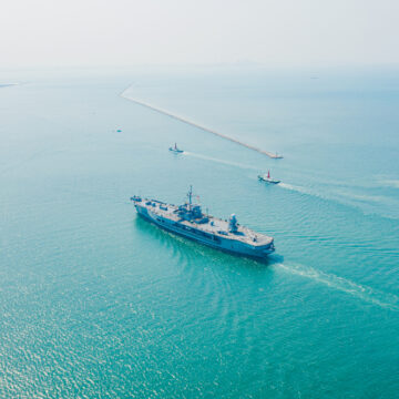 Aerial View Of An Aircraft Carrier At Sea