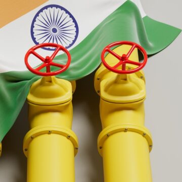 Image Of Yellow Gas Pipelines With Red Valves Set Against The National Flag Of India