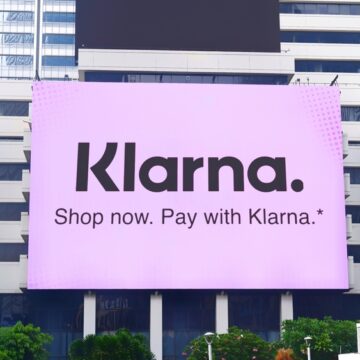 A Billboard Advertisement Which Says "Shop Now. Pay With Klarna." On The A Building In Jakarta A Billboard Advertisement Which Says "Shop Now. Pay With Klarna." On The A Building In Jakarta