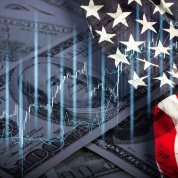 A Composite Image Representing The U.S. Economy And Financial Markets, Combining Elements Of U.S. Currency, The American Flag, And Stock Market Graphs