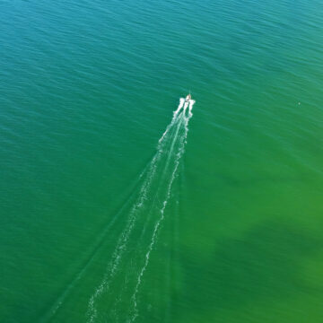 Aerial,View,On,Small,Fishing,Boat,Sailing,Straight,At,Sea ‘KILL THEM ALL’