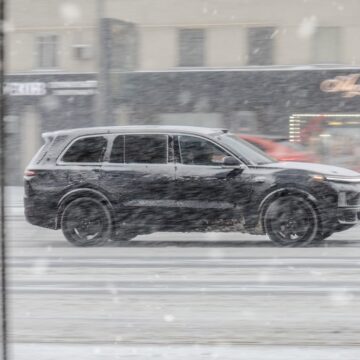 A Li Auto L9, A Full-size Luxury Crossover SUV Produced By The Chinese Manufacturer Li Auto, Driving On A Snowy City Street In Moscow, Russia