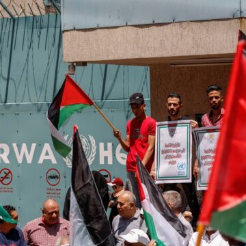 Palestinian Refugees With National Flags Gather Outside The United Nations Relief And Works Agency (UNRWA) in Gaza, Palestine, on June 20, 2023