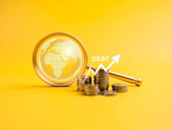 Growth,Graph,With,Word,Debt,On,Coin,Stacks,Near,Magnifying GLOBAL DEBT, THE HUMAN BUBBLE AND THE POLICE-STATE PIVOT