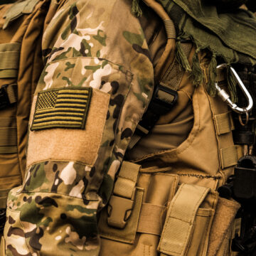 The Uniform And Gear Of A U.S. Service Member Wearing The Operational Camouflage Pattern (OCP) Uniform Commonly Referred To As MultiCam Or Scorpion OCP
