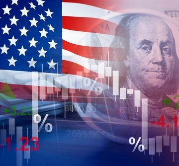Composite graphic representing the U.S. financial market, featuring the U.S. flag and a portrait of Benjamin Franklin overlaid with a candlestick stock chart. Composite graphic representing the U.S. financial market, featuring the U.S. flag and a portrait of Benjamin Franklin overlaid with a candlestick stock chart.