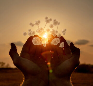 A close up of hands cupped together, showcasing a glowing, digital-style molecular structure, a concept often used to illustrate molecular physics, biochemistry, or technological connection in medicine. A close up of hands cupped together, showcasing a glowing, digital-style molecular structure, a concept often used to illustrate molecular physics, biochemistry, or technological connection in medicine.