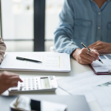 KPMG WANGLES DISCOUNT ON ITS AUDIT, CLAIMING AI CUT THE COST