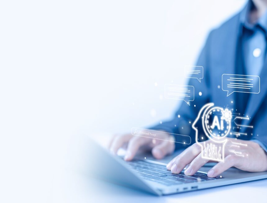 Concept graphic of AI integration showing a man interacting with AI technology via a laptop. Concept graphic of AI integration showing a man interacting with AI technology via a laptop.