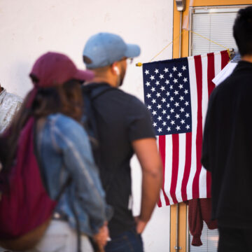 An Image Of Gen-Z Aged Voters Waiting In Line At A Polling Place In Fullerton, California, On November 6, 2018, During The U.S. Midterm Elections.