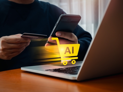Concept image of AI in e-commerce, showing a shopping cart icon labeled "AI" moving from a mobile device to a laptop.