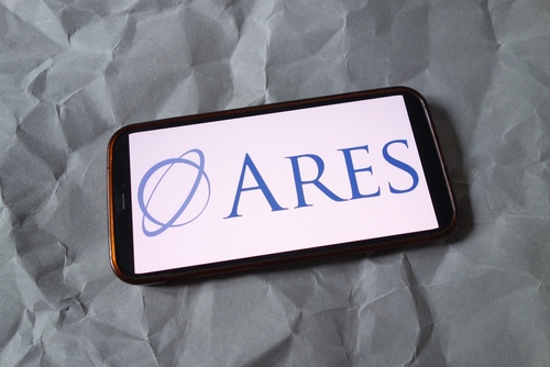 The logo for Ares Management Corporation on a smartphone screen.