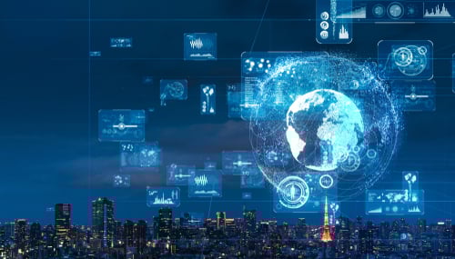 Technological concept of a digital globe over a city skyline representing industrial automation, global connectivity and data exchange.