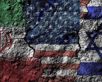 The flags of Iran, the United States, and Israel painted on a cracked, textured wall.