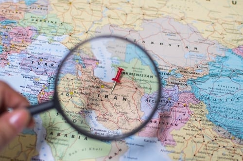 A,Magnifying,Glass,Zooming,In,On,A,Map,Of,Iran, TRUMP SAYS HE BELIEVED IRAN WAS GOING TO STRIKE FIRST, CONTRADICTING RUBIO’S EARLIER COMMENT