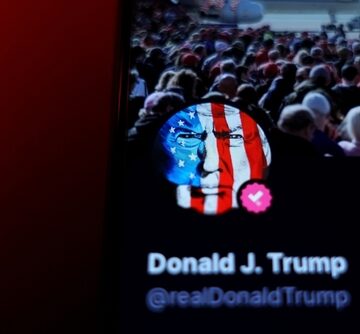 A screenshot of Donald Trump's Truth Social media profile featuring an artistic rendition of Trump with the American flag overlaid on his face, and a background showing a large, crowded rally