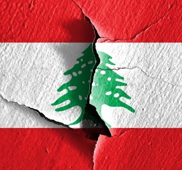 The,Lebanese,Flag,Is,Made,Of,Textures.,Concept,Illustration,Depicting ISRAEL TARGETS LEBANON AS IRAN WAR THREATENS TO BECOME AN ALL-OUT REGIONAL WAR