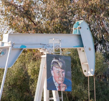 Oil field workers hung a portrait of Donald Trump on an oil pump in Huntington Beach, California