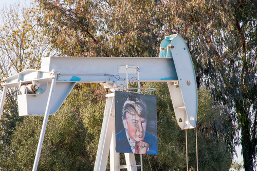 Oil field workers hung a portrait of Donald Trump on an oil pump in Huntington Beach, California