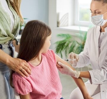 Child,Receives,Vaccination,Injection,From,Doctor.,A,Nurse,Uses,A MAJORITY OF AMERICANS BELIEVE VACCINES ARE SAFE, CHILDREN SHOULD TAKE THEM TO ATTEND SCHOOL