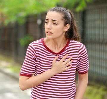 Young,Woman,Suffering,From,Heart,Attack,Outdoors MORE YOUNG PEOPLE ARE DYING FROM HEART ATTACKS, NEW STUDY SAYS