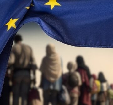 Flag,Of,The,European,Union,Eu,And,A,Group,Of EUROPEAN COUNTRIES BRACE FOR SURGE IN IMMIGRATION FROM MIDDLE EAST AMID IRAN WAR