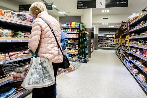 A shopper in a Marks & Spencer (M&S) Food store in London, UK.