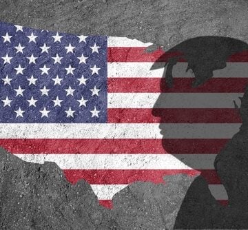 A digital image overlaying a profile silhouette of Donald Trump onto a map of the United States featuring the American flag pattern.