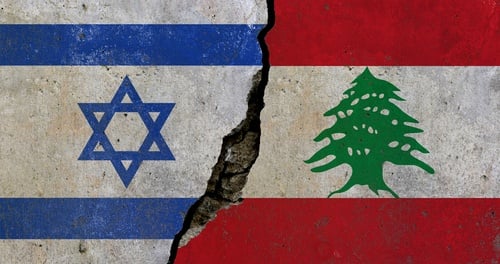 Conceptual image depicting geopolitical conflict with the national flags of Israel and Lebanon separated by a crack in a concrete wall.