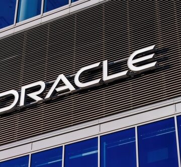 The logo for the multinational computer technology corporation Oracle on a building exterior.