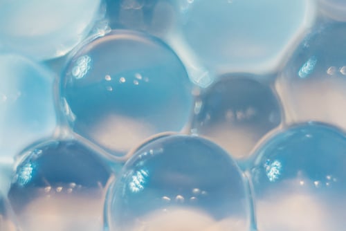 A close-up photograph of hydrogel beads.
