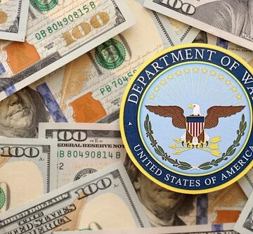 Kyiv,,Ukraine,-,September,17,,2025,Us,Department,Of,War A United States Department of War badge placed on top of US hundred-dollar bills.