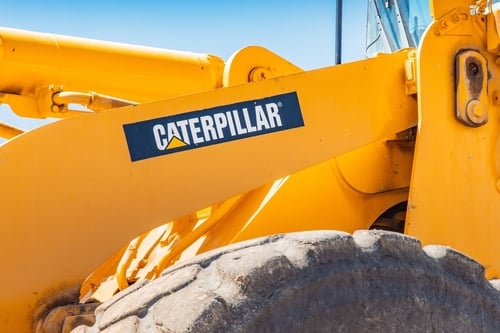 A Caterpillar construction vehicle, likely a wheel loader or excavator.
