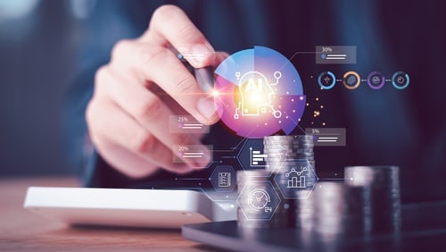 Digital AI concept of technology into financial management showing a person interacting with digital graphs, data overlays, and stacks of coins highlighting cash flow management and forecasting.