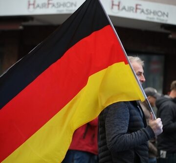 Demonstrators holding the German flag during a right-wing protests in Germany.