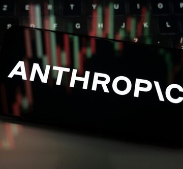 The Anthropic logo on a mobile phone screen with a computer keyboard in the background. The Anthropic logo on a mobile phone screen with a computer keyboard in the background.