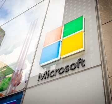 The Microsoft logo on the exterior of a building.