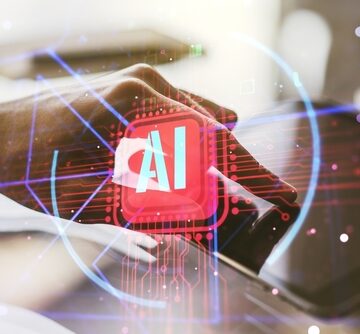 Double,Exposure,Of,Creative,Artificial,Intelligence,Abbreviation,And,Hand,Working A double exposure effect combining a digital tablet with a technological circuit board graphic.