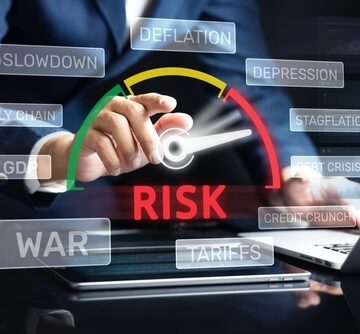 Concept illustration for supply chain risk management, highlighting potential factors such as war, tariffs, and inflation featuring a speedometer indicating rising economic volatility, with the needle pointing towards high-risk indicators. Concept illustration for supply chain risk management, highlighting potential factors such as war, tariffs, and inflation featuring a speedometer indicating rising economic volatility, with the needle pointing towards high-risk indicators.