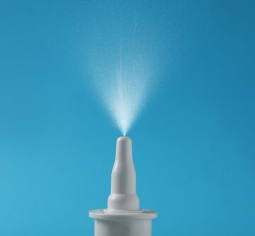 Nasal,Spray,With,Sprinkled,Medication,Over,Nozzle,On,Light,Blue NASAL SPRAY REVERSED BRAIN AGING IN A MOUSE EXPERIMENT