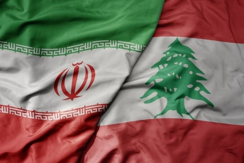 The national flags of Iran and Lebanon arranged together side by side.