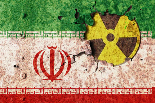 Iran,Flag,On,Metal,Wall.,Conflict,Of,Atomic,Technology TRUTH OR CONSEQUENCES? IRAN SAYS THERE HAVE BEEN NO DISCUSSIONS ON NUCLEAR ISSUE, DESPITE PRESIDENT’S CLAIM