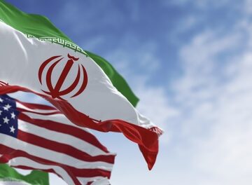 The,National,Flags,Of,Iran,And,The,Usa,Waving,On YES OR NO? IRAN AGREEING TO NUCLEAR INSPECTORS