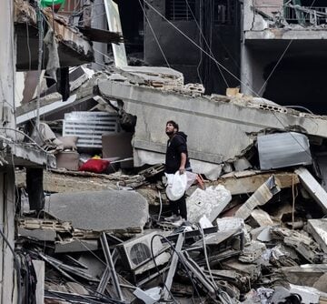Beirut,,Lebanon,11,27,2024:,Man,In,Southern,Suburbs,Of Palestinians inspecting the debris and damage caused by an Israeli airstrike on a residential building in the Rimal neighborhood of Gaza City.