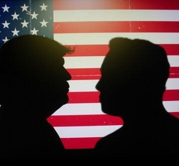 The silhouettes of Donald Trump and Elon Musk facing each other against an American flag.