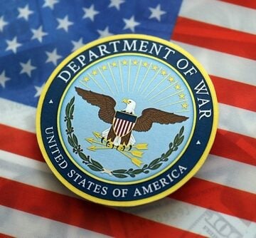 Kyiv,,Ukraine,-,September,17,,2025,Us,Department,Of,War The historical seal for the United States Department of War, the precursor to the modern Department of Defense sitting atop the U.S. flag.