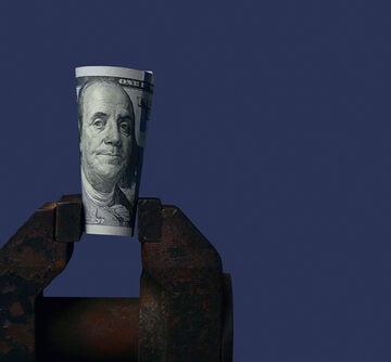 Us,Dollars,Sandwiched,In,An,Old,Vice,,Toned U.S. CONSUMERS ARE ABOUT TO RUN OUT OF CASH, ECONOMISTS WARN