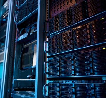 A modern data center server room, which is a physical facility housing computing systems like servers and storage. A modern data center server room, which is a physical facility housing computing systems like servers and storage.
