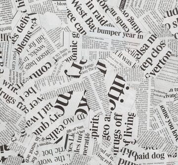 A collage of torn newspaper and magazine clippings. A collage of torn newspaper and magazine clippings.